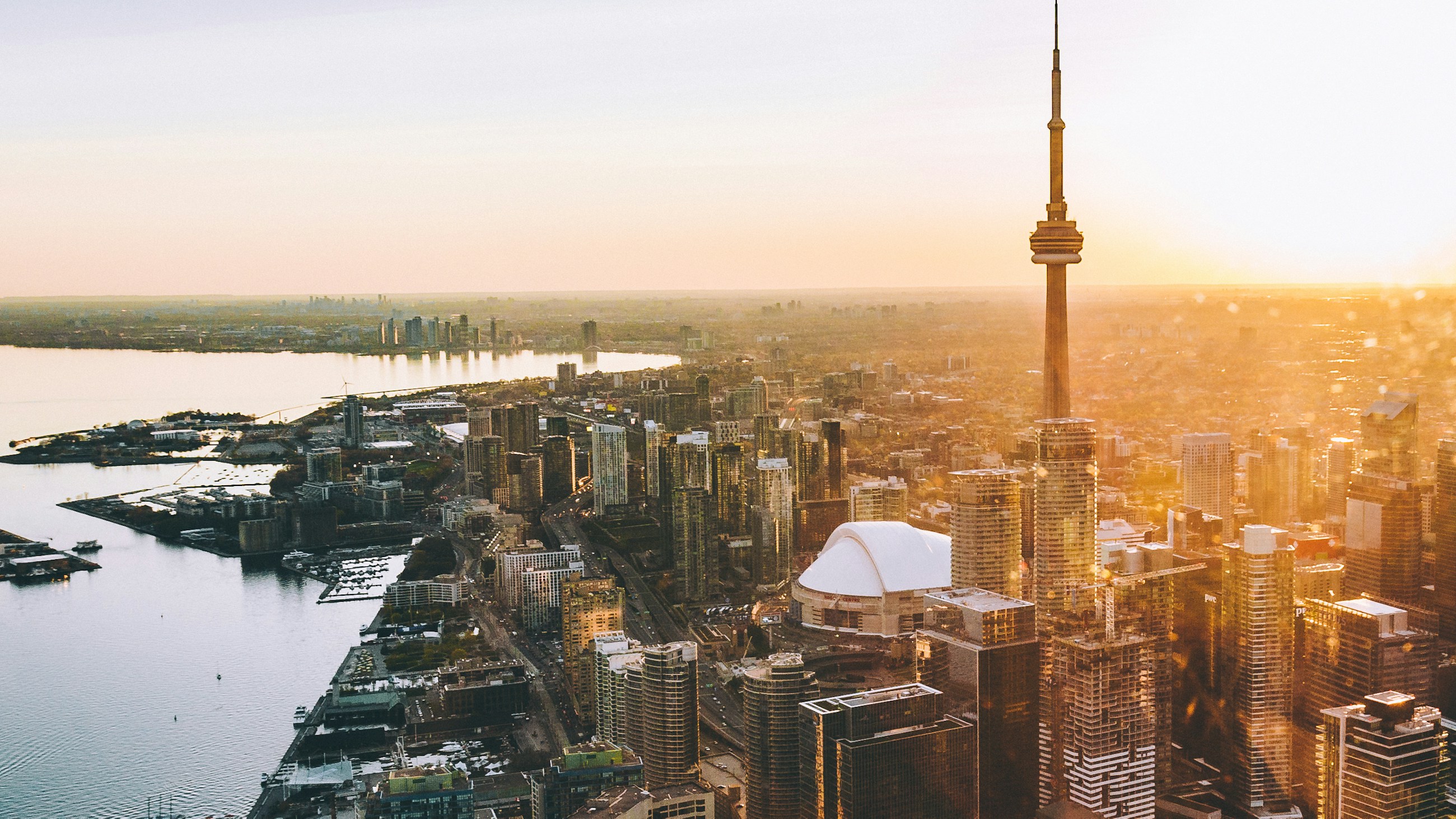 Greater Toronto Area aerial skyline at golden hour with CN Tower